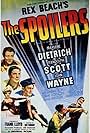 Marlene Dietrich, Randolph Scott, John Wayne, and Harry Carey in The Spoilers (1942)