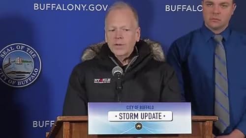 Tim Clark answers press questions regarding movie shoot in severe weather.