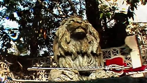 Only one man suspects  that a lion statue in his apartment complex just drowned the girl of his dreams.