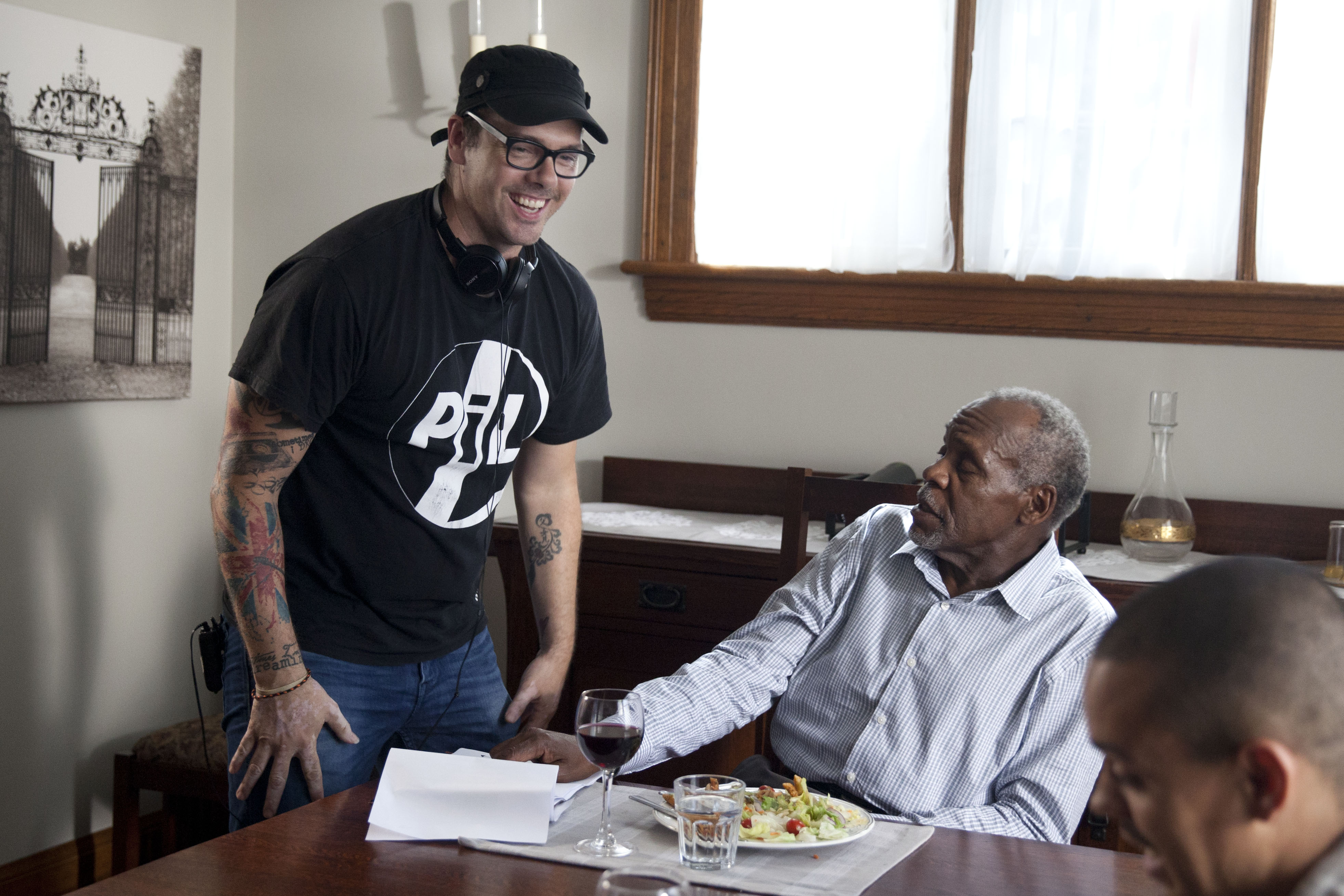 Director Matthew Currie Holmes with Danny Glover and Evan Ross on the set of Buckout Road