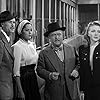 John Carradine, Acquanetta, Evelyn Ankers, and Lloyd Corrigan in Captive Wild Woman (1943)