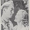 Barbara Britton and Macdonald Carey in Wake Island (1942)