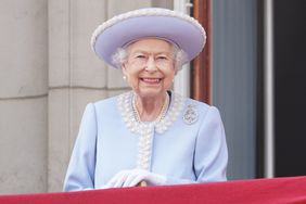 Queen Elizabeth II watches from the balcony of Buckingham Palace during the Trooping the Colour parade